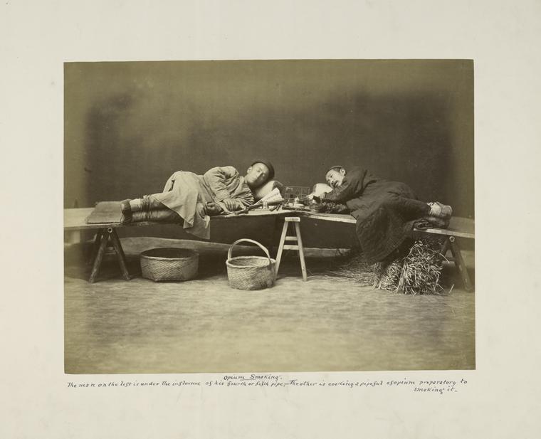 Opium Smoking, The Man on the Left is Under the Influence of His Fourth or Fifth Pipe, The Other is Cooking a Pipeful of Opium Preparatory to Smoking it